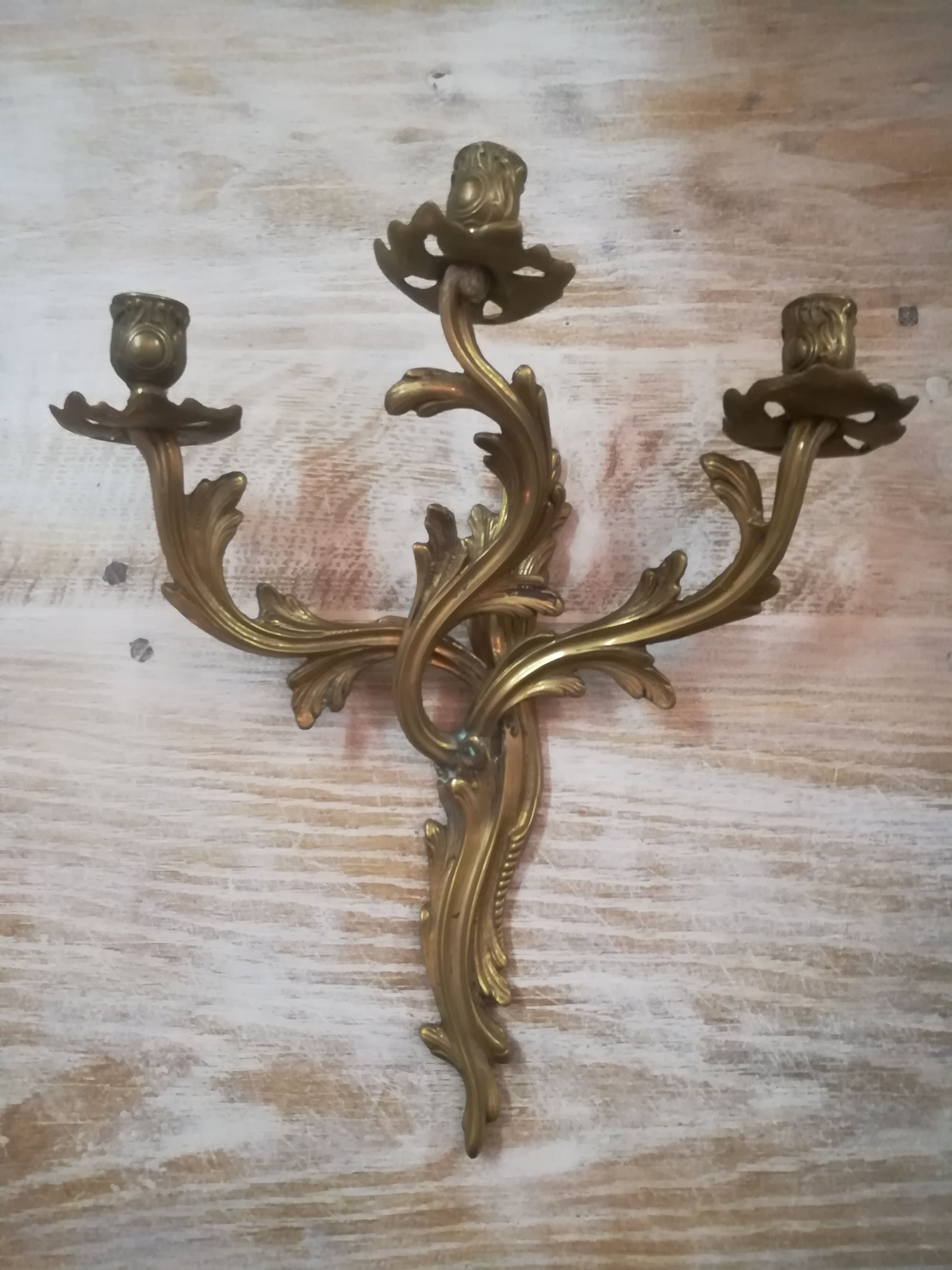 Pair of Louis XV style gilded bronze sconces