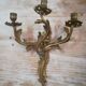 Pair of Louis XV style gilded bronze sconces