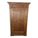 Antique rustic wardrobe in raw wood
