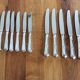 Lot of 6 large knives and 6 small silver metal ercuis