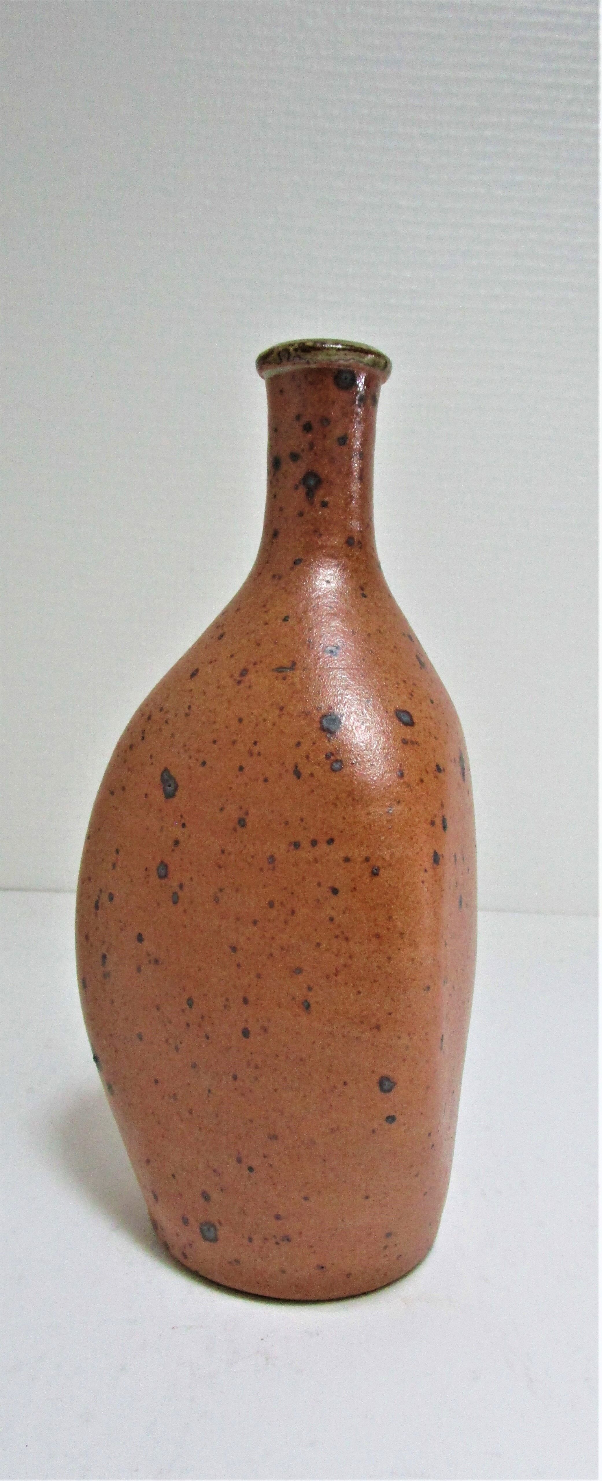 Soliflore vase in pyrite sandstone with three vintage faces