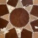 Vintage round cowhide rug 70