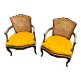 Paire de fauteuils cannés de style Louis XV