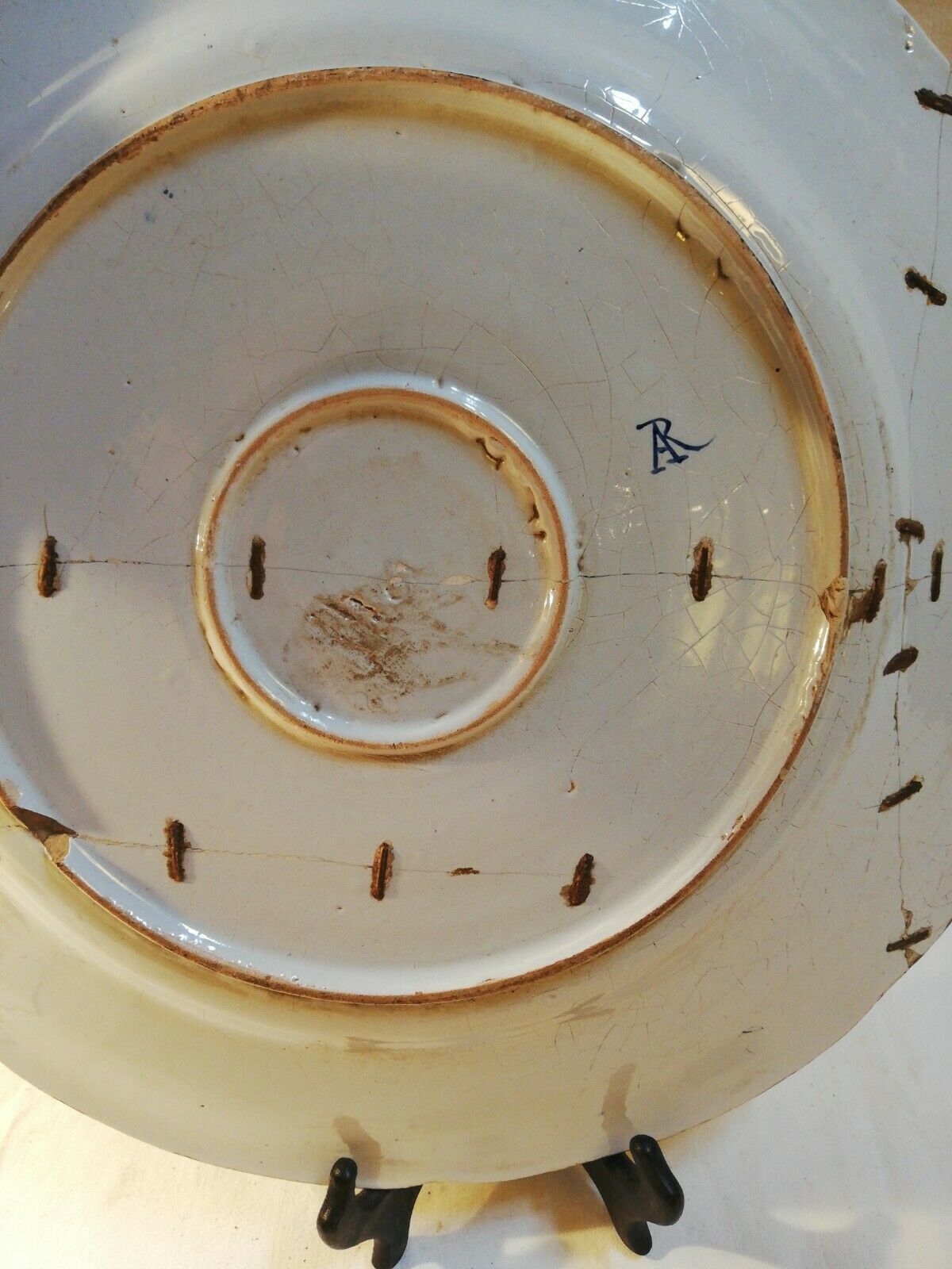 Rouen earthenware dish decorated coat of arms