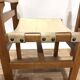 Pair of Maison Regain leather chairs