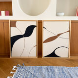 Beige, black, brown diptych design panels.