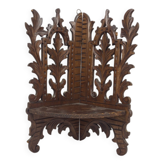 Carved wooden corner shelf