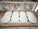 12 dessert plates in porcelain with double gold trim.