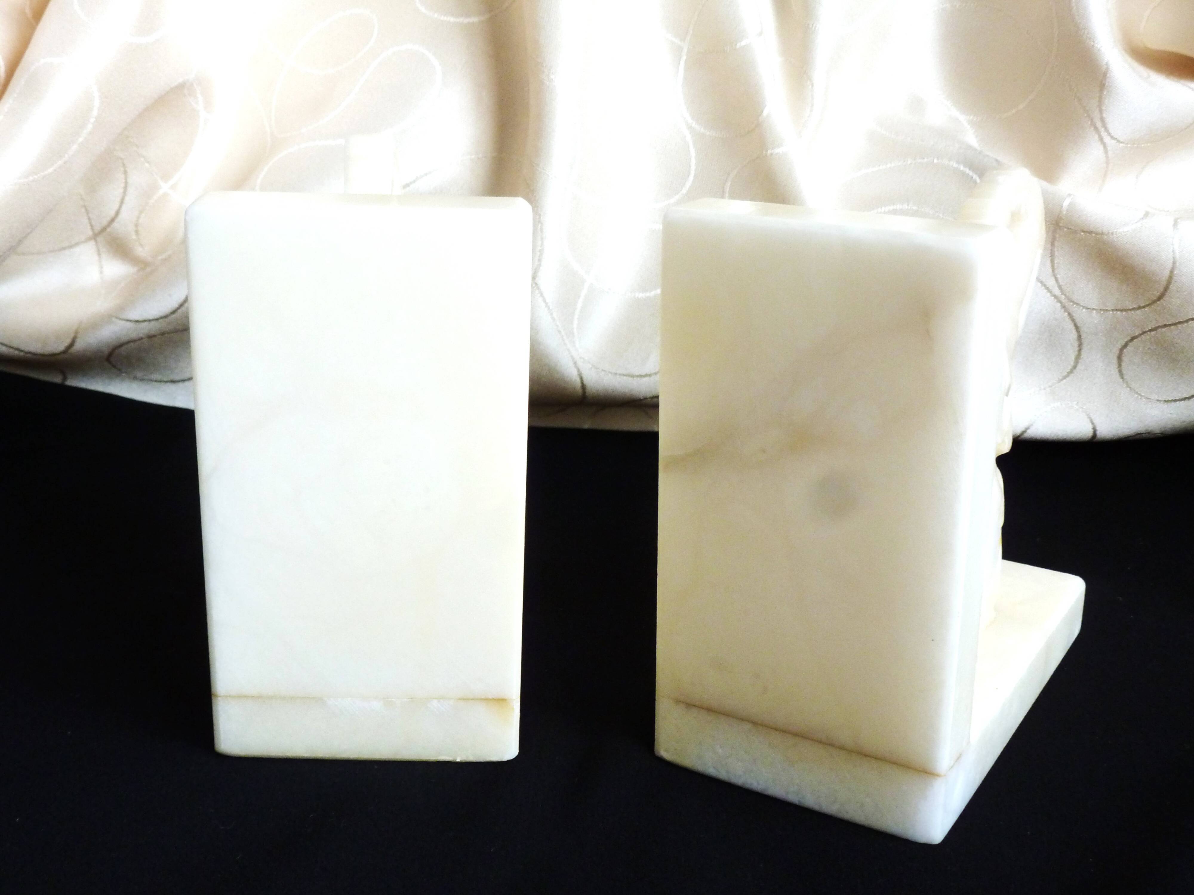 Pair of alabaster elephant bookends, library accessories
