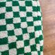 Moroccan Berber pouf with fir green and bohemian off-white checkered