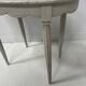 Art Deco style guéridon in patinated beech, 20th century.