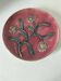 Large antique plate in floral slip with hand-painted relief decoration