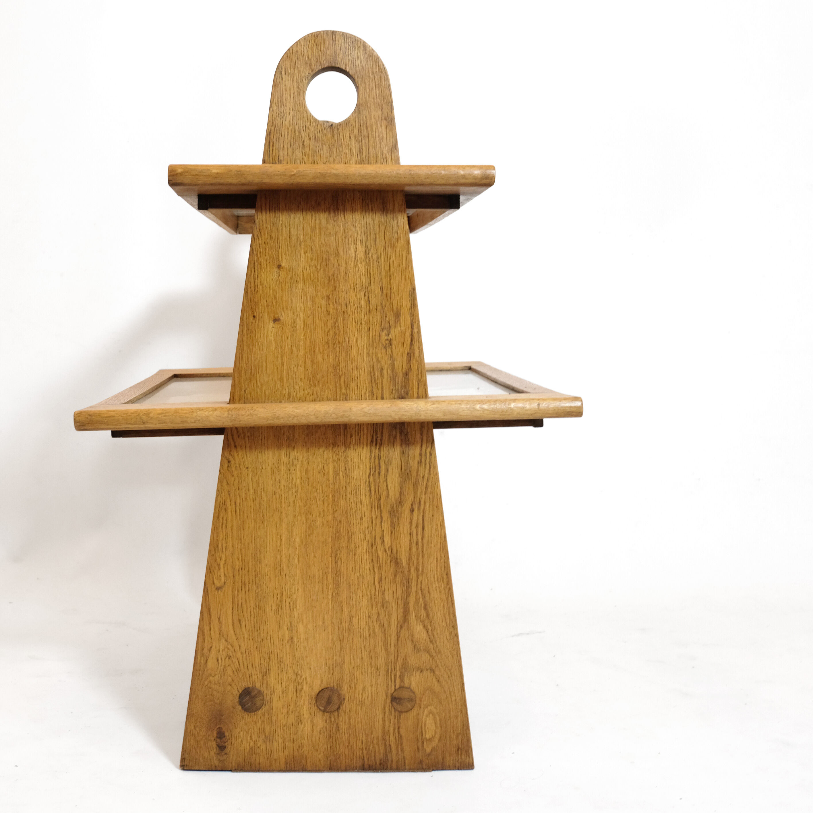 Served in oak and glass from the 50s and 60s.