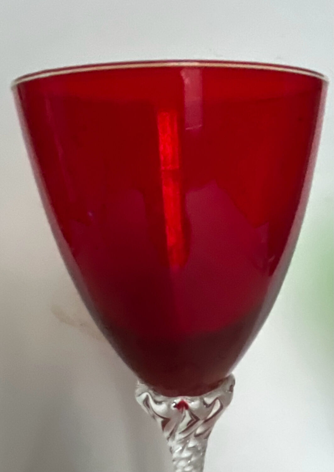 4 coloured stemmed glasses