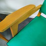 Pair of wood and vinyl armchairs