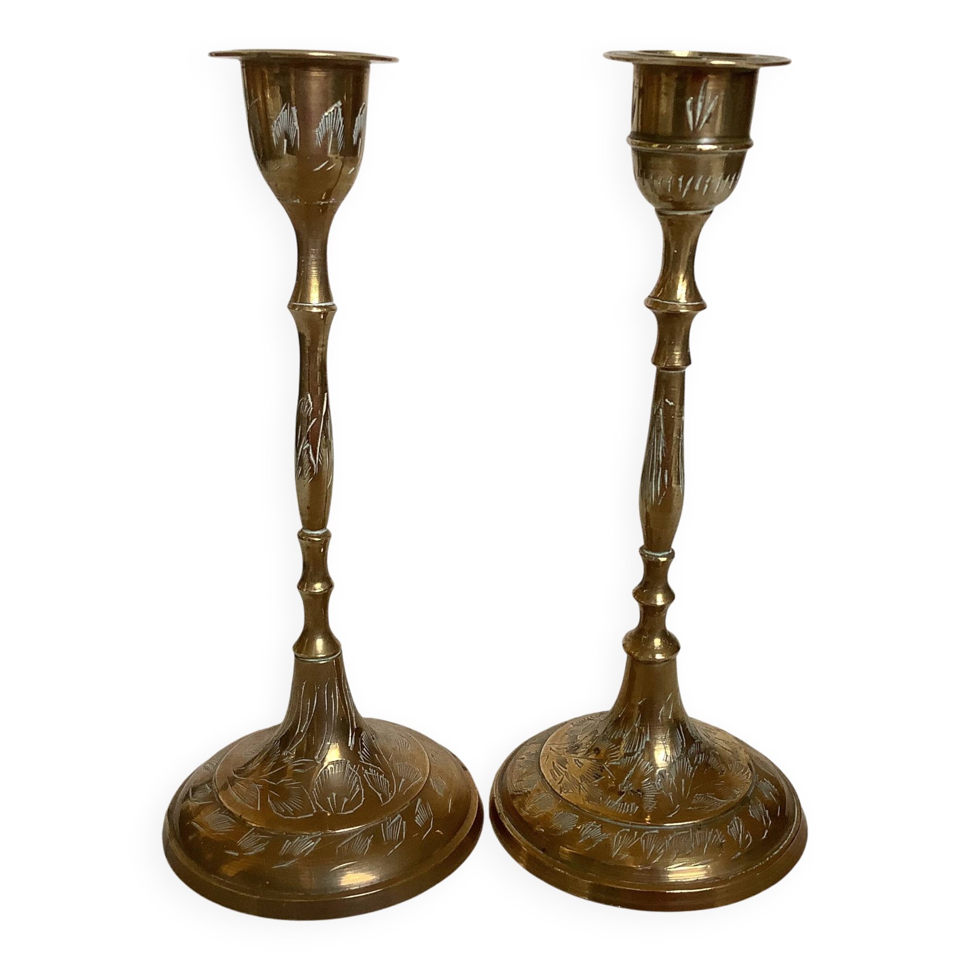 Pair of worked brass candlesticks