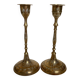 Pair of worked brass candlesticks
