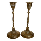 Pair of worked brass candlesticks