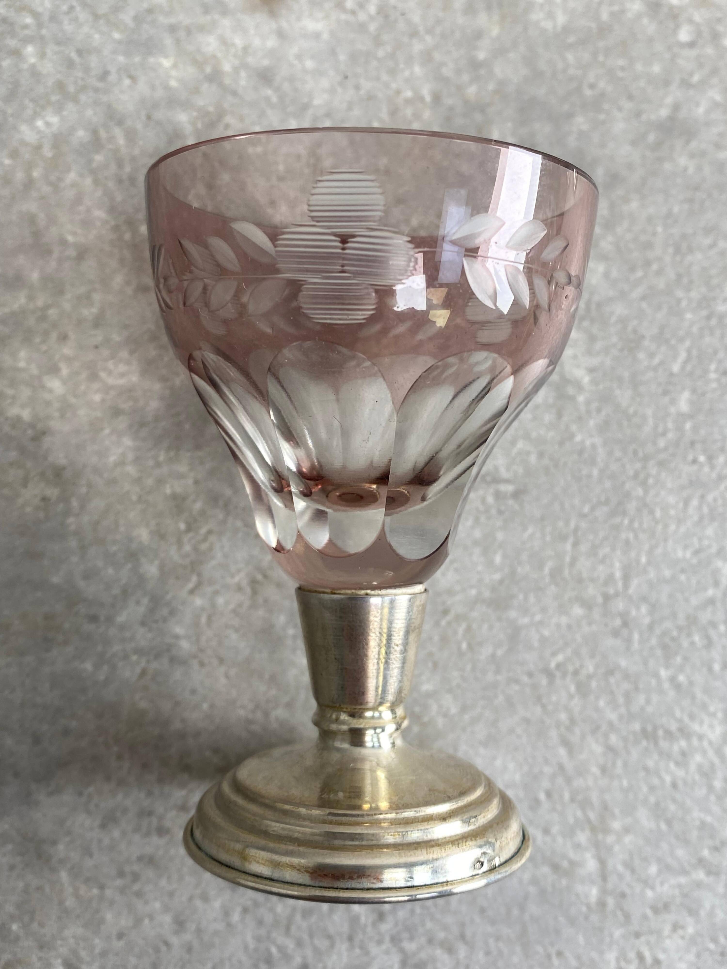 Set of 6 coloured stemmed glasses on silver stems.
