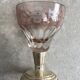 Set of 6 coloured stemmed glasses on silver stems.