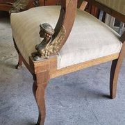 Pair of walnut armchairs in Empire style, Egyptian revival.