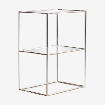 Small shelf consisting of two glass plates and a chrome-plated steel structure