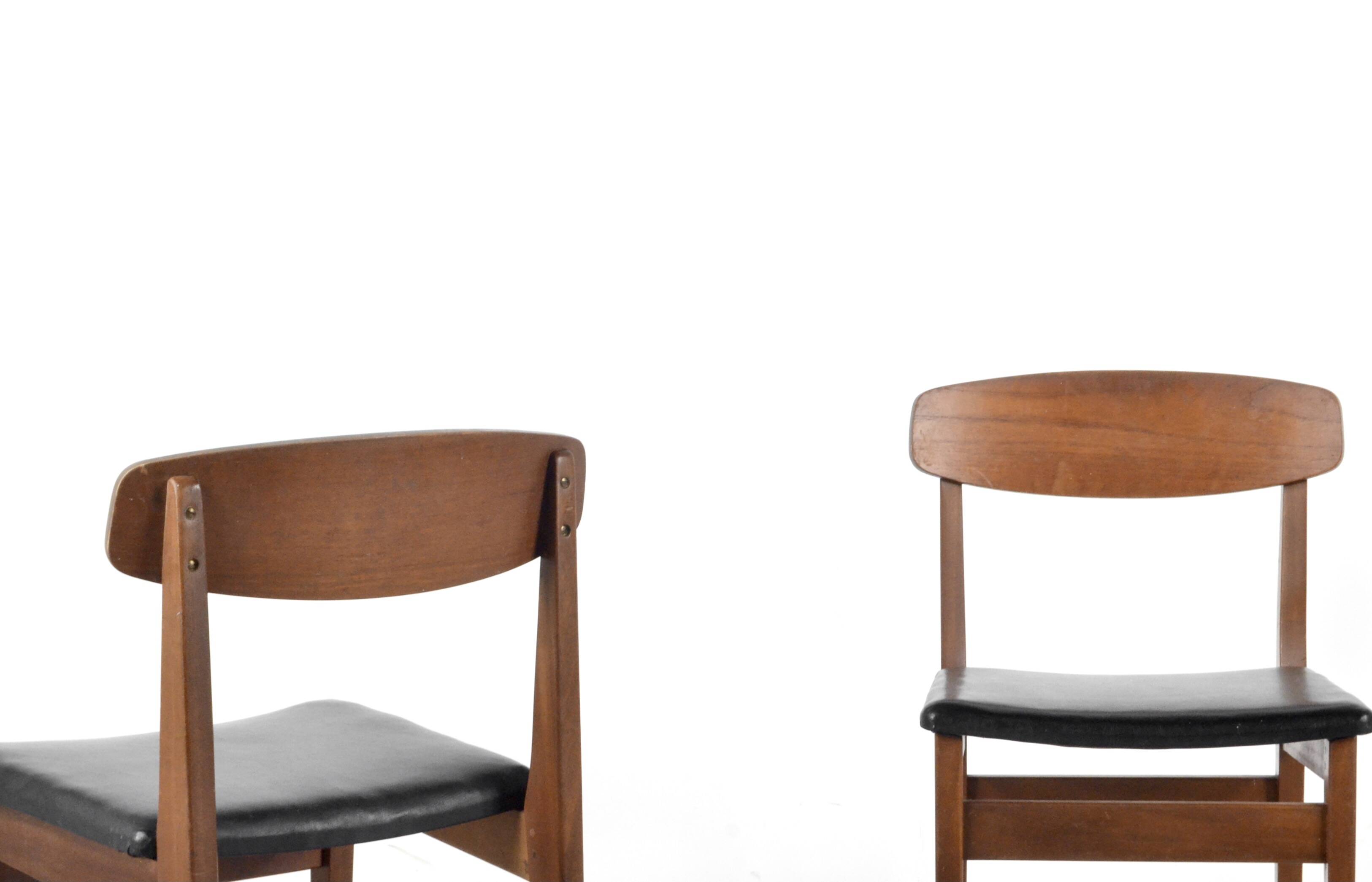 Set Of 4 Midcentury Teak And Leatherette Chairs.