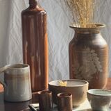 Large antique stoneware bottle with a small cork stopper
