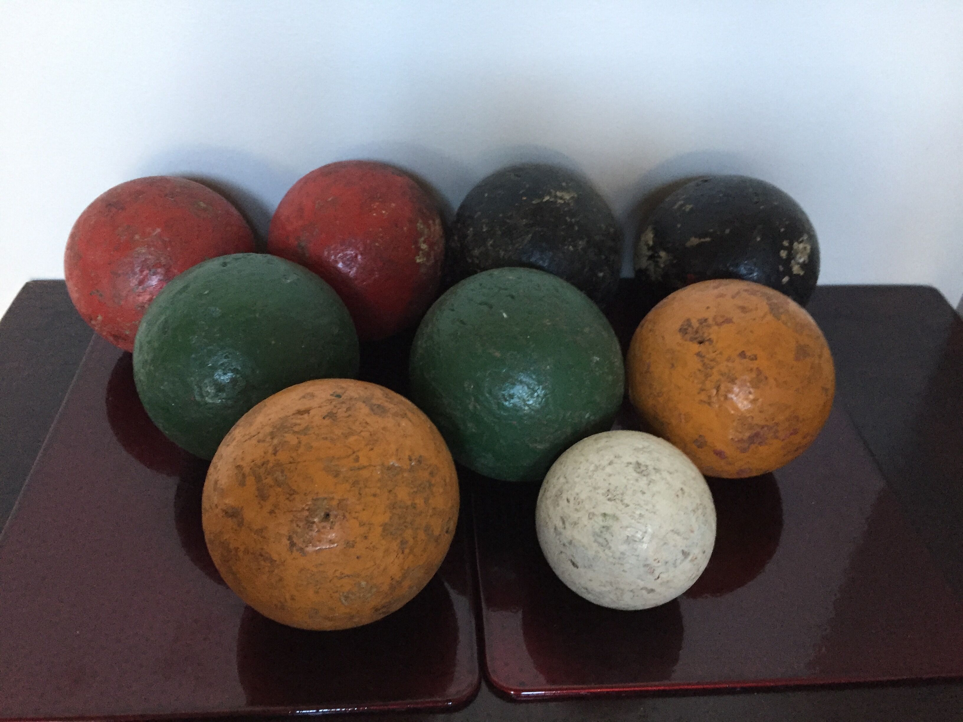 Very old game of wooden petanque balls with piglet