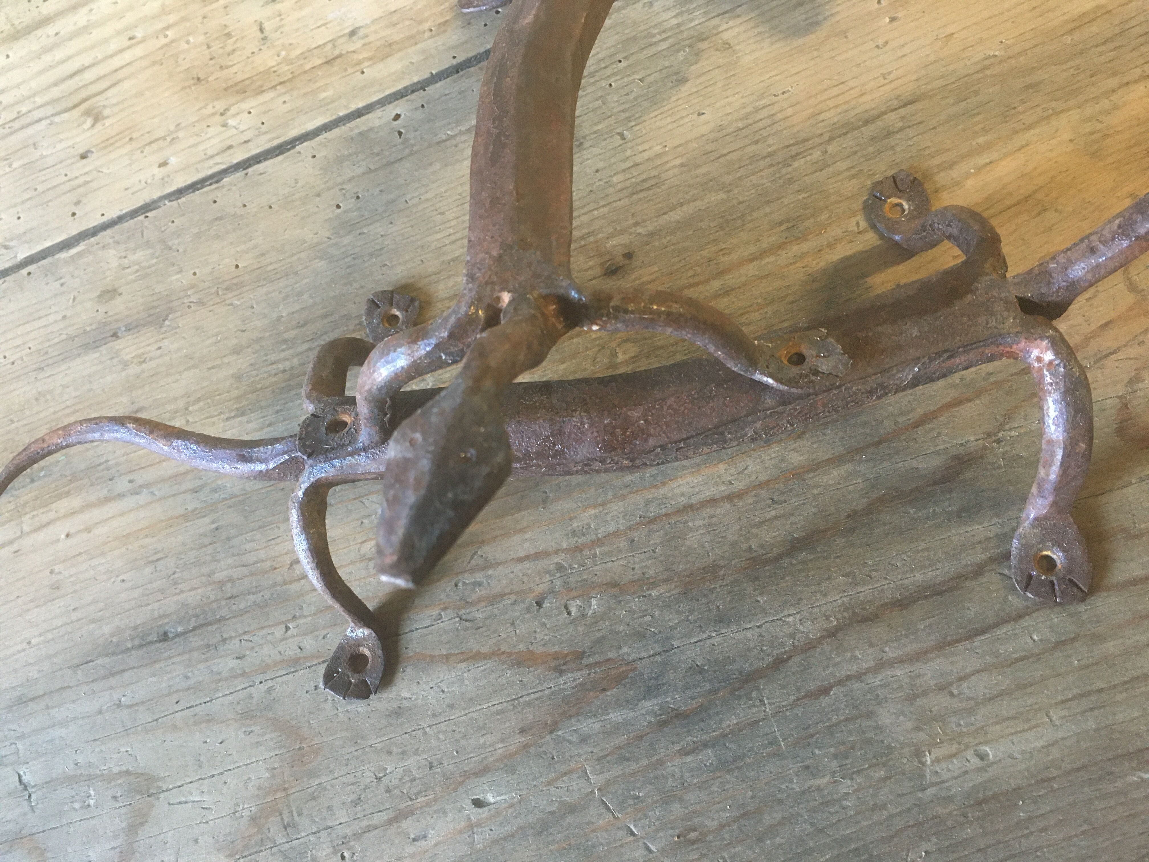 Door handles "Lizards" in handcrafted recycled wrought iron