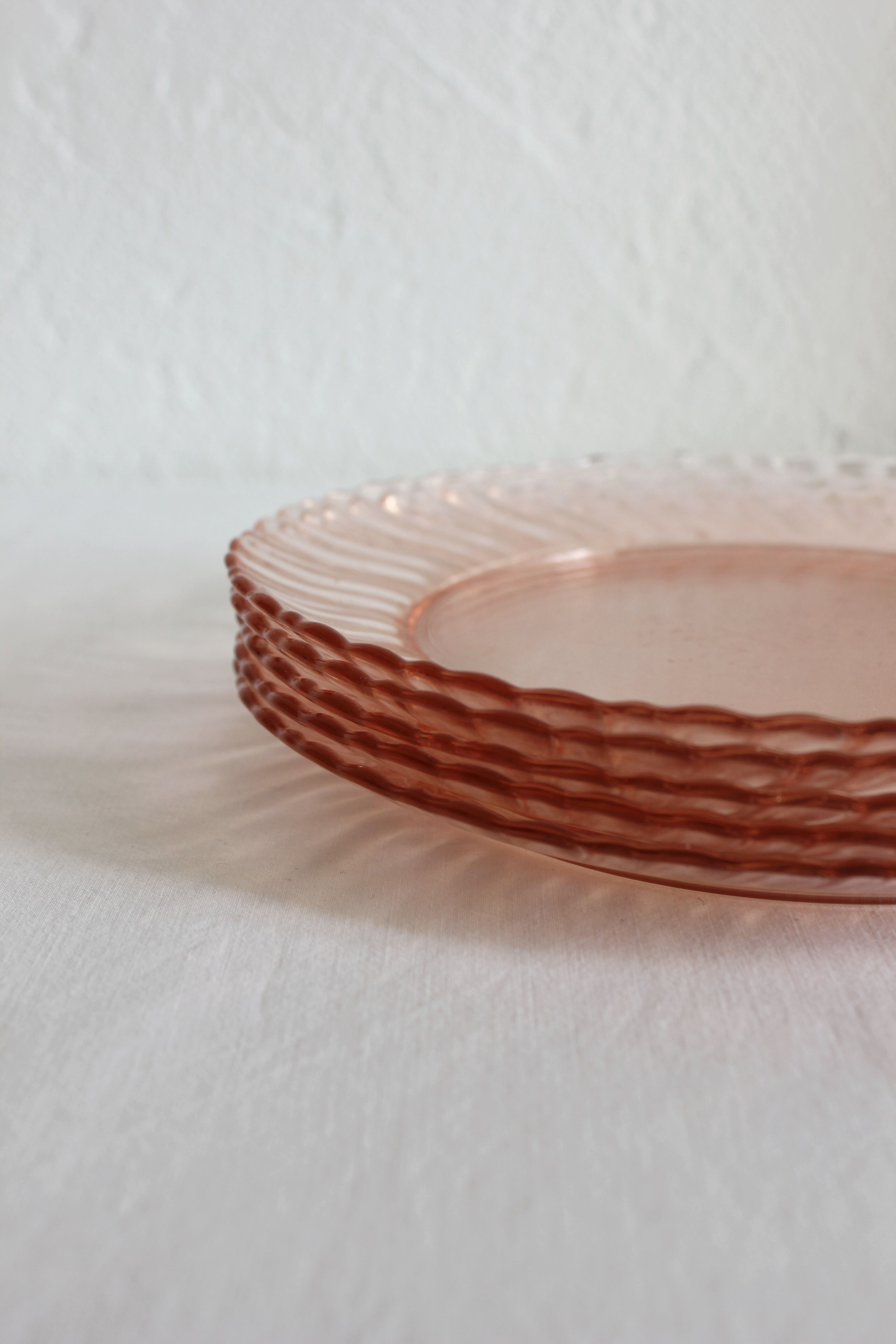 5 vintage Rosaline dessert plates in pink glass