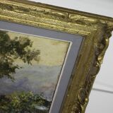 large painting of lake and countryside