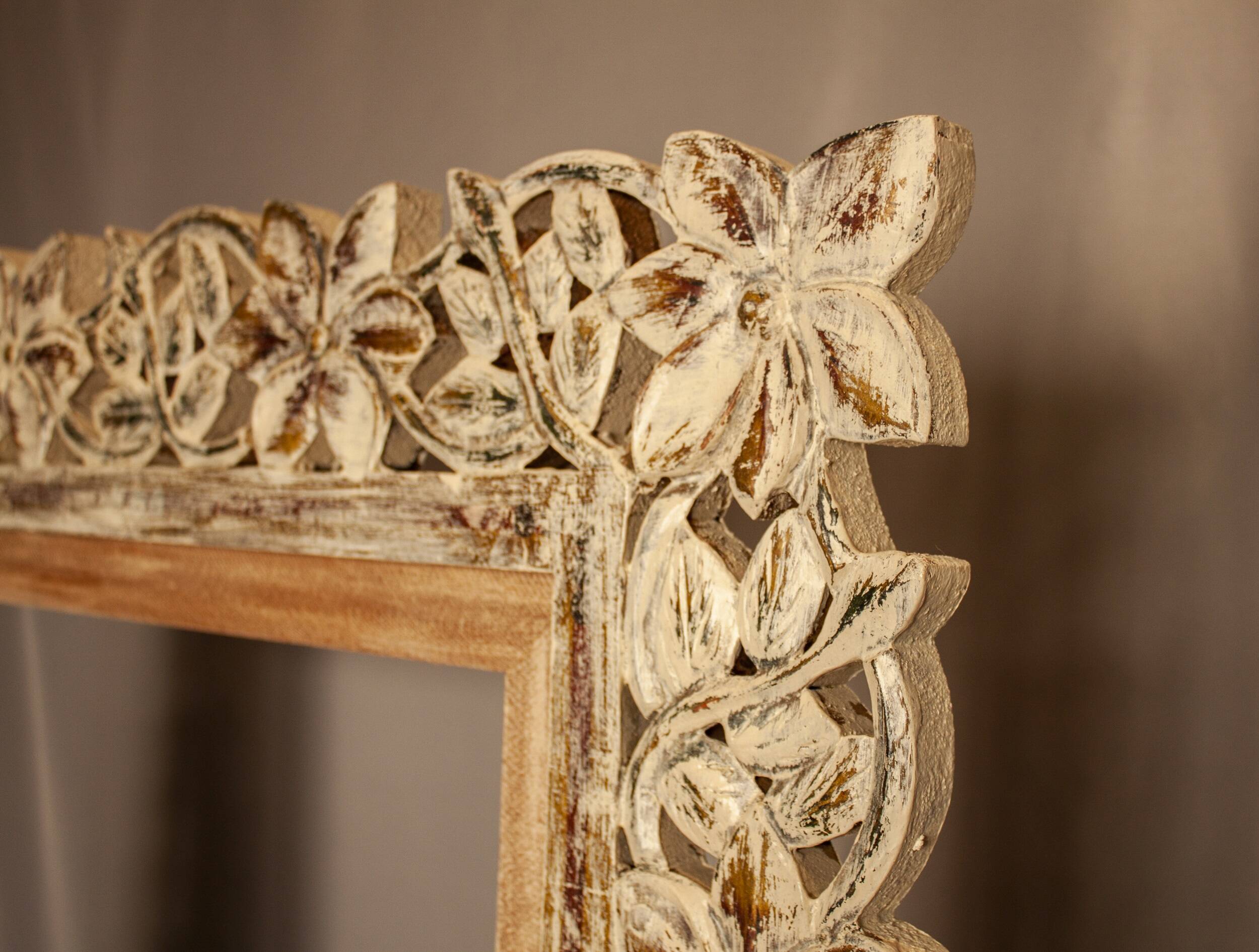 Carved wooden frame. carved wooden frame with floral motifs.