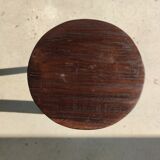 Small high tripod stool in brown solid wood