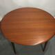 Round scandinavian teak table