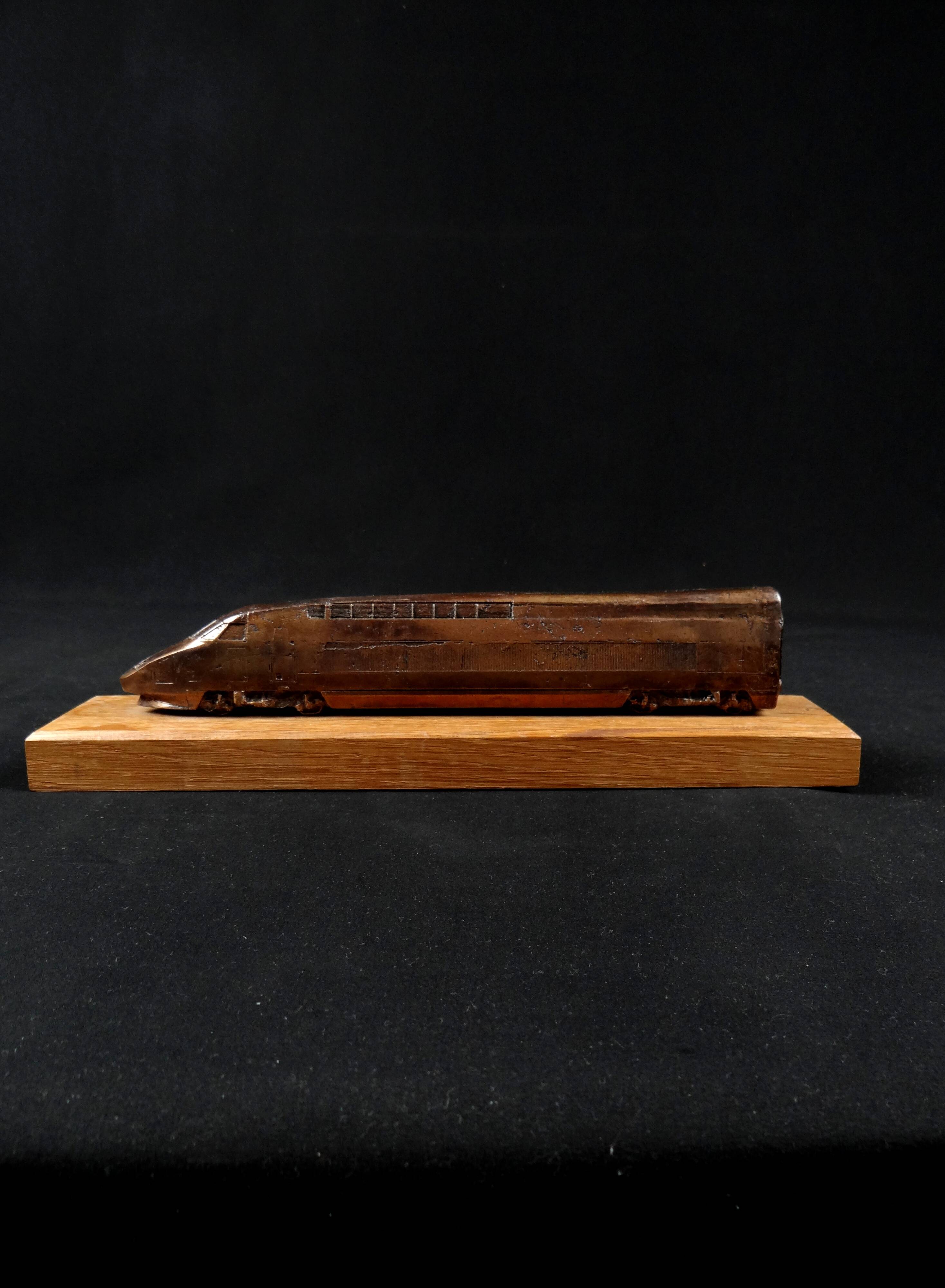Bronze TGV on a wooden base, scale model of the TGV Sud-Est from the 1980s