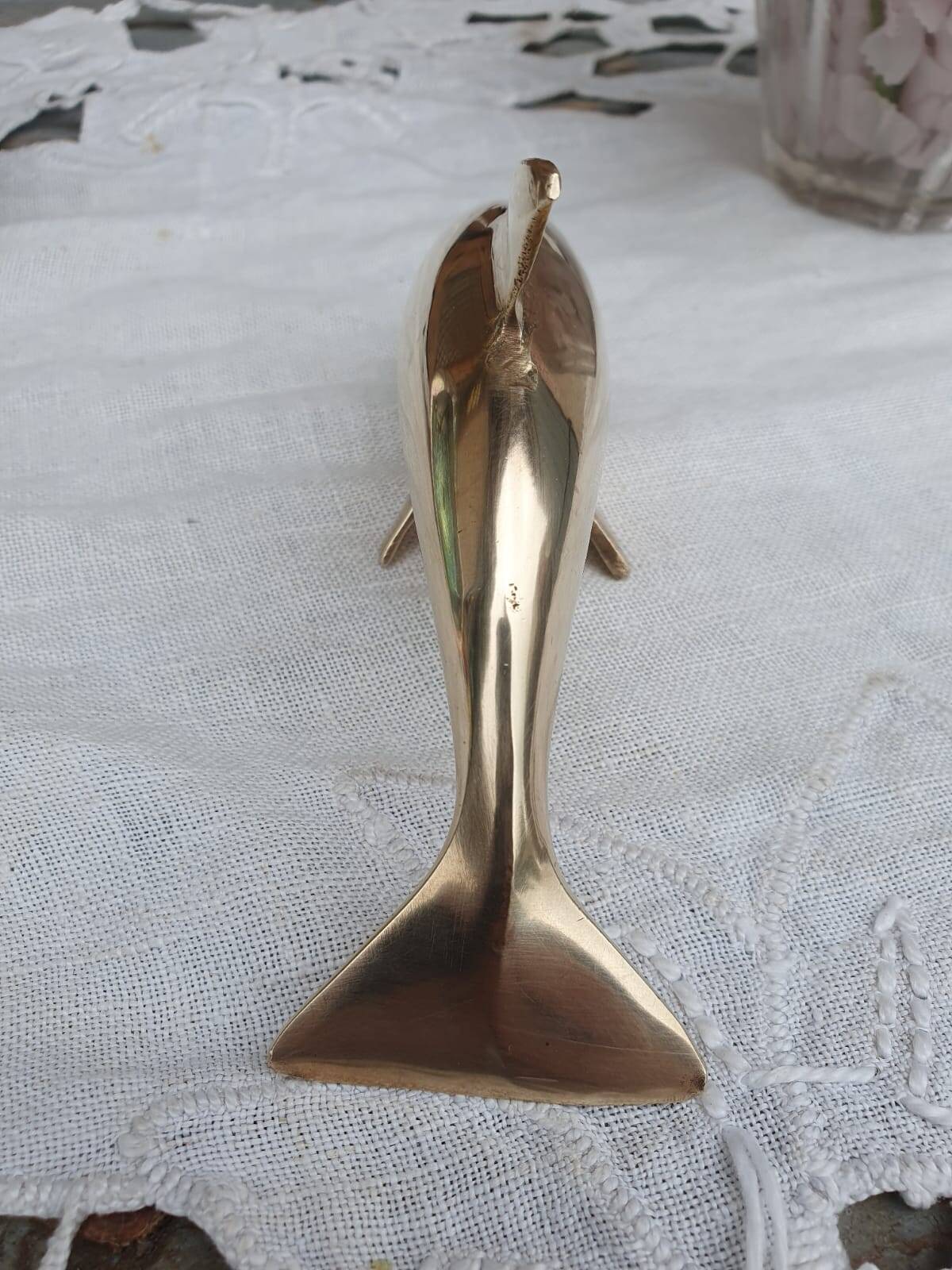 brass dolphin