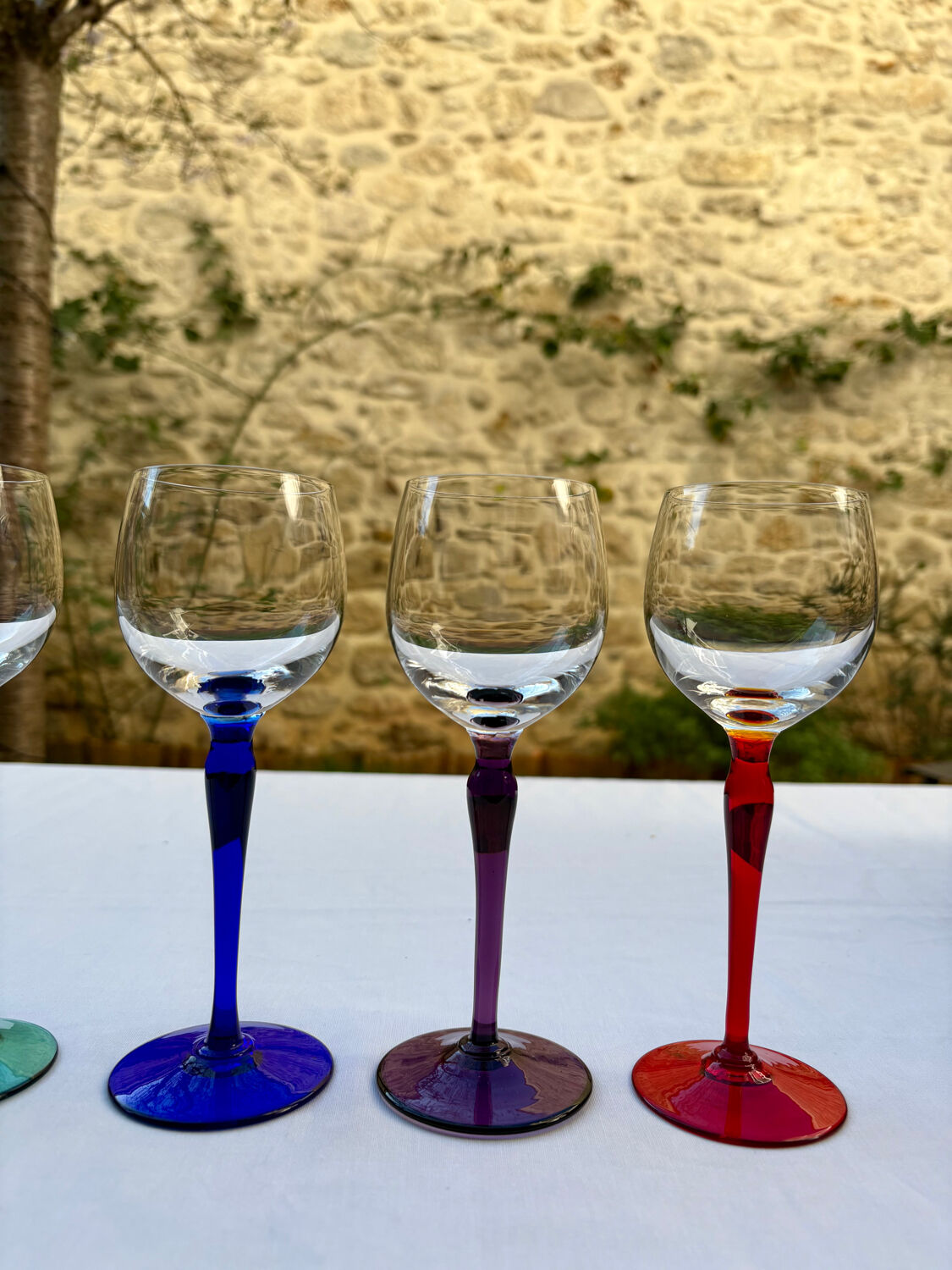 6 crystal glasses with coloured stems