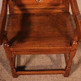 high-backed armchair from the 17th century in oak