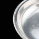 Plat en métal argenté vintage, creux rond à frise de laurier