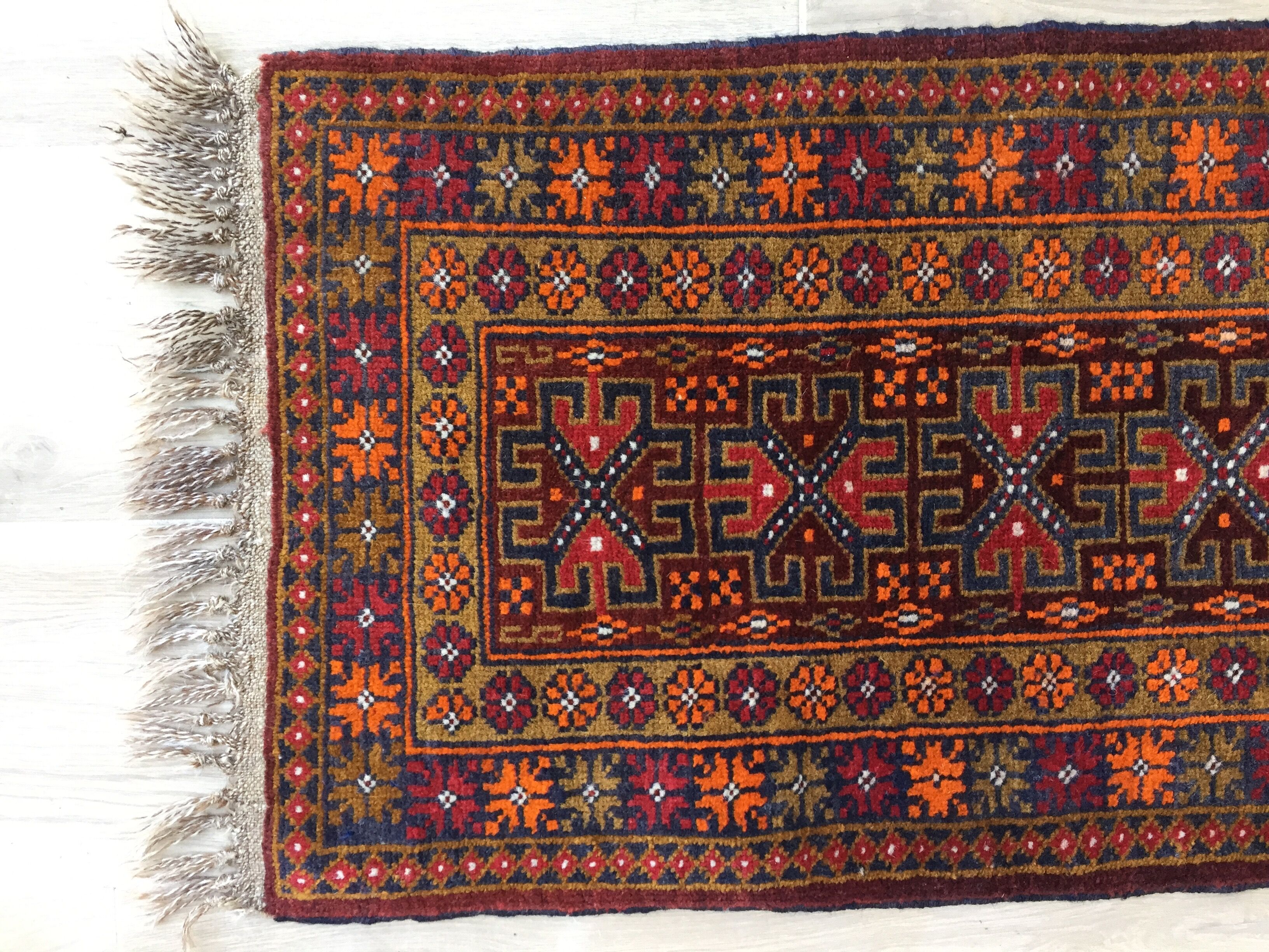 Small oriental wool rug - 80 x 46cm