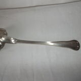 Powdered sugar spoon in silver metal