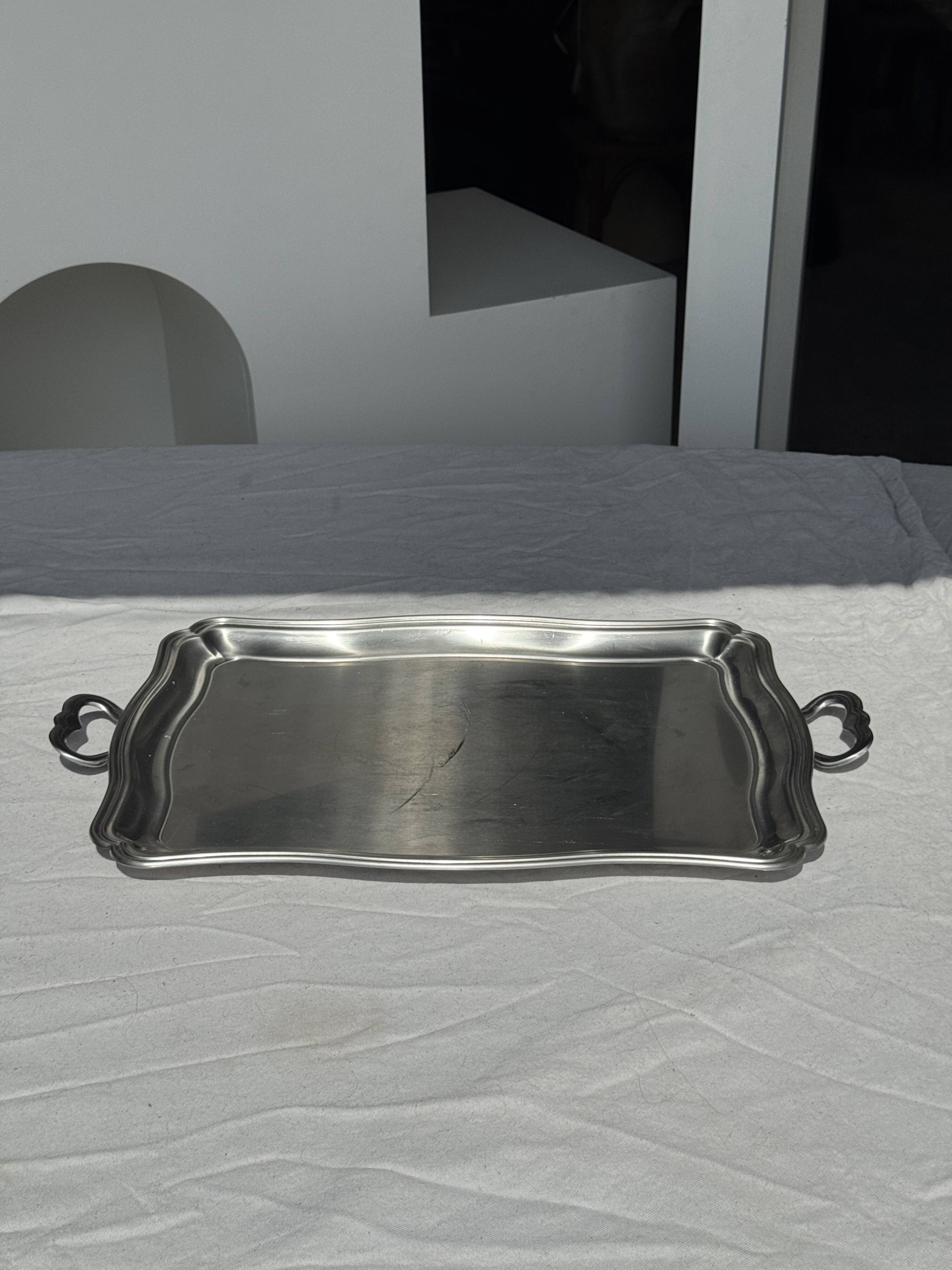 Guy Degrenne silver stainless steel serving tray with an eventful shape
