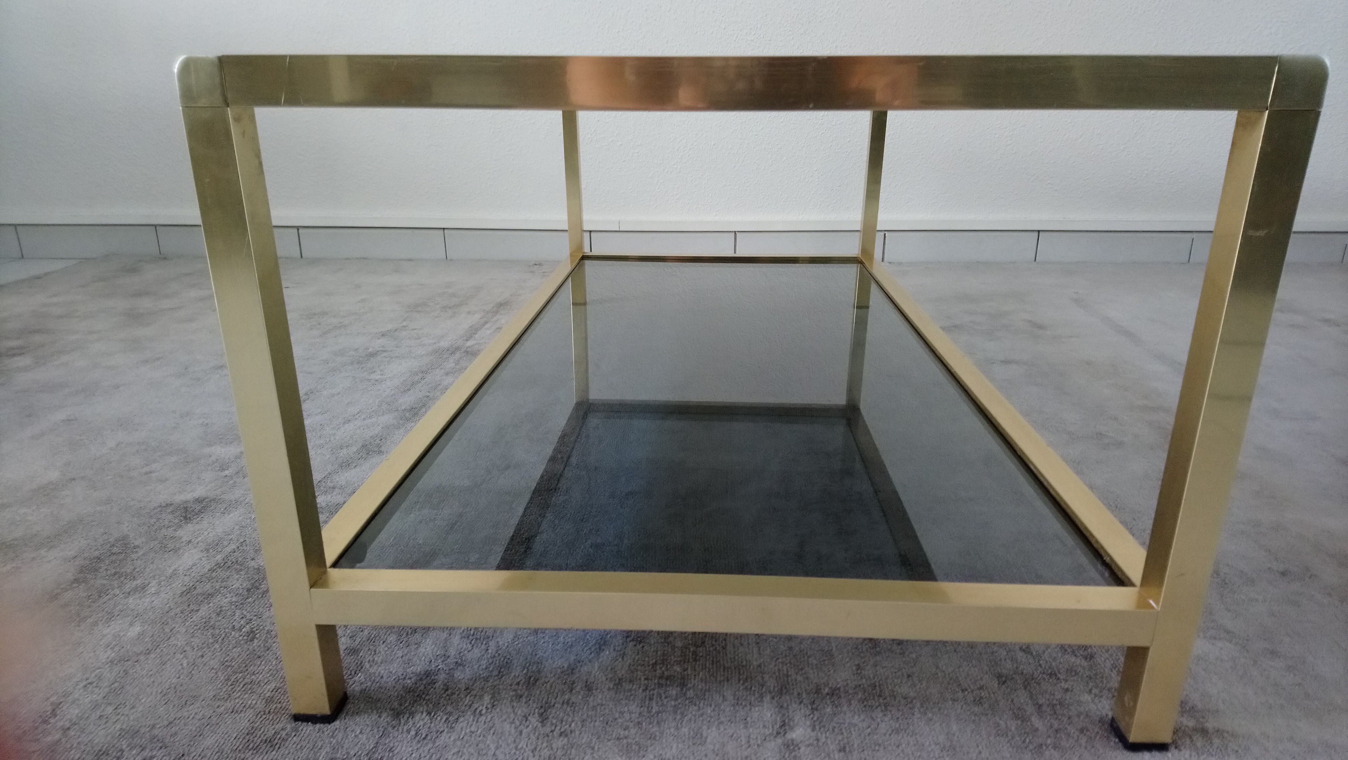Table low brass and smoked glass 70s