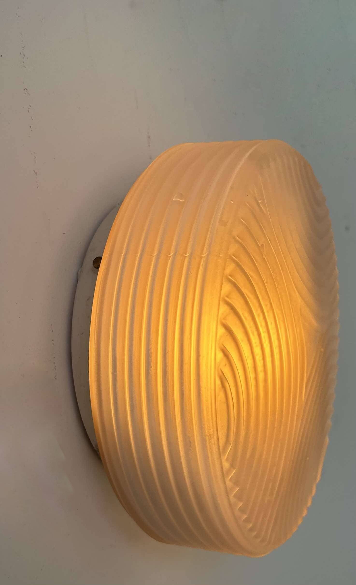 Vintage wall lamp in pressed molded sandblasted glass, France 1960