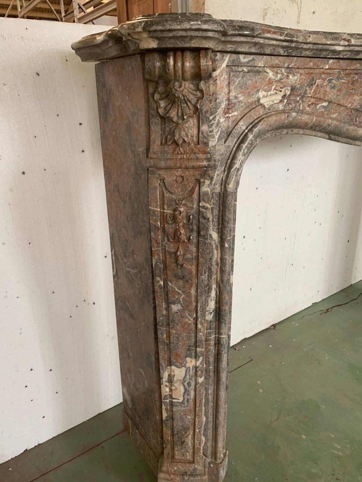Louis XV style fireplace in red breche marble 19th century