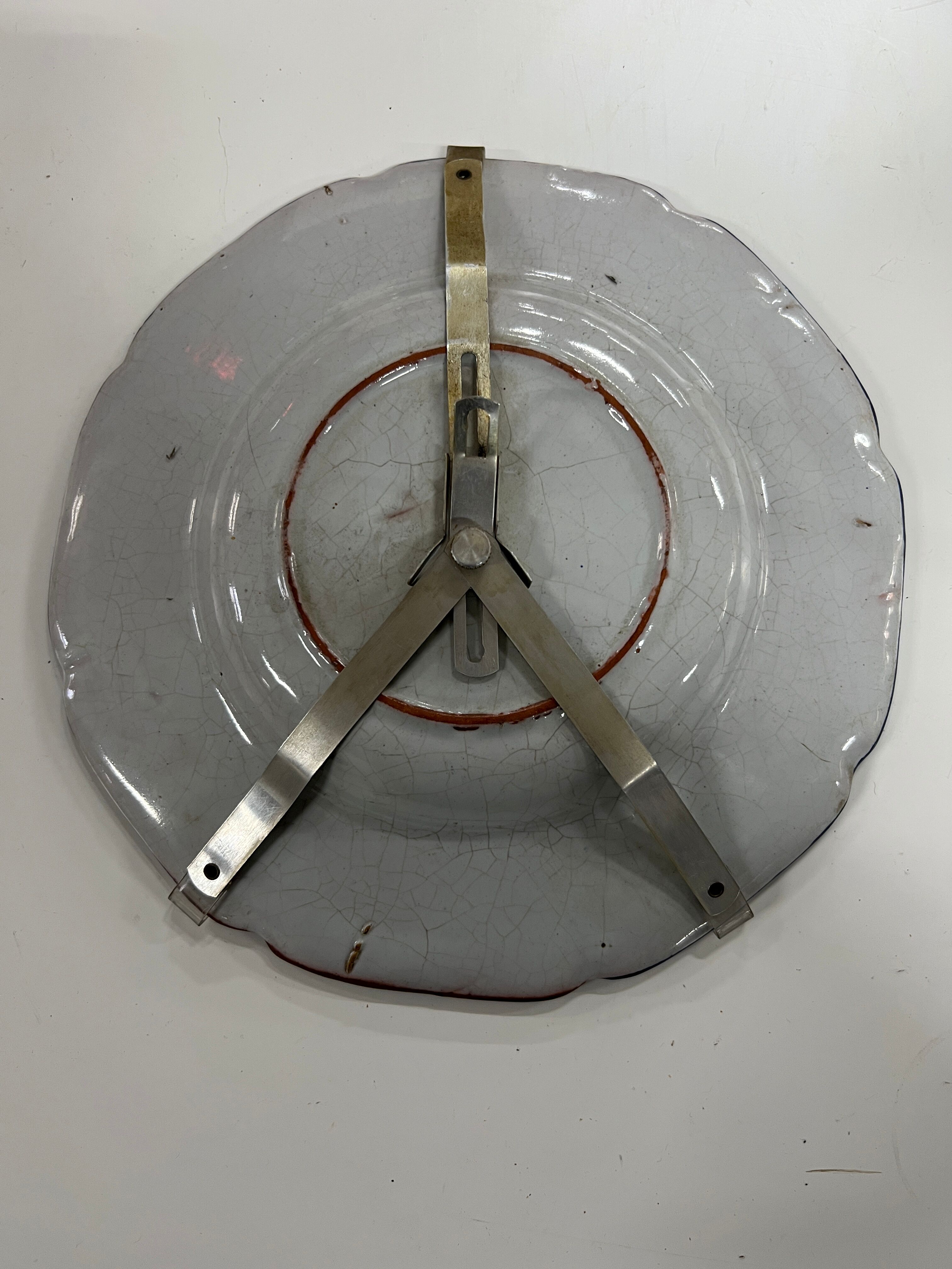 Decorative ceramic plate with wall hanging