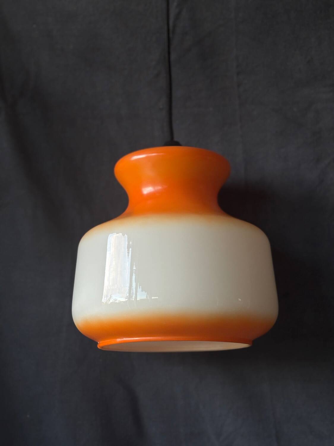 Vintage orange and white opaline pendant light from the 1960s