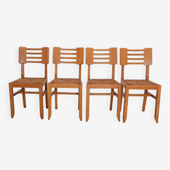 Suite de 4 chaises style Pierre Cruège datant des années 50.