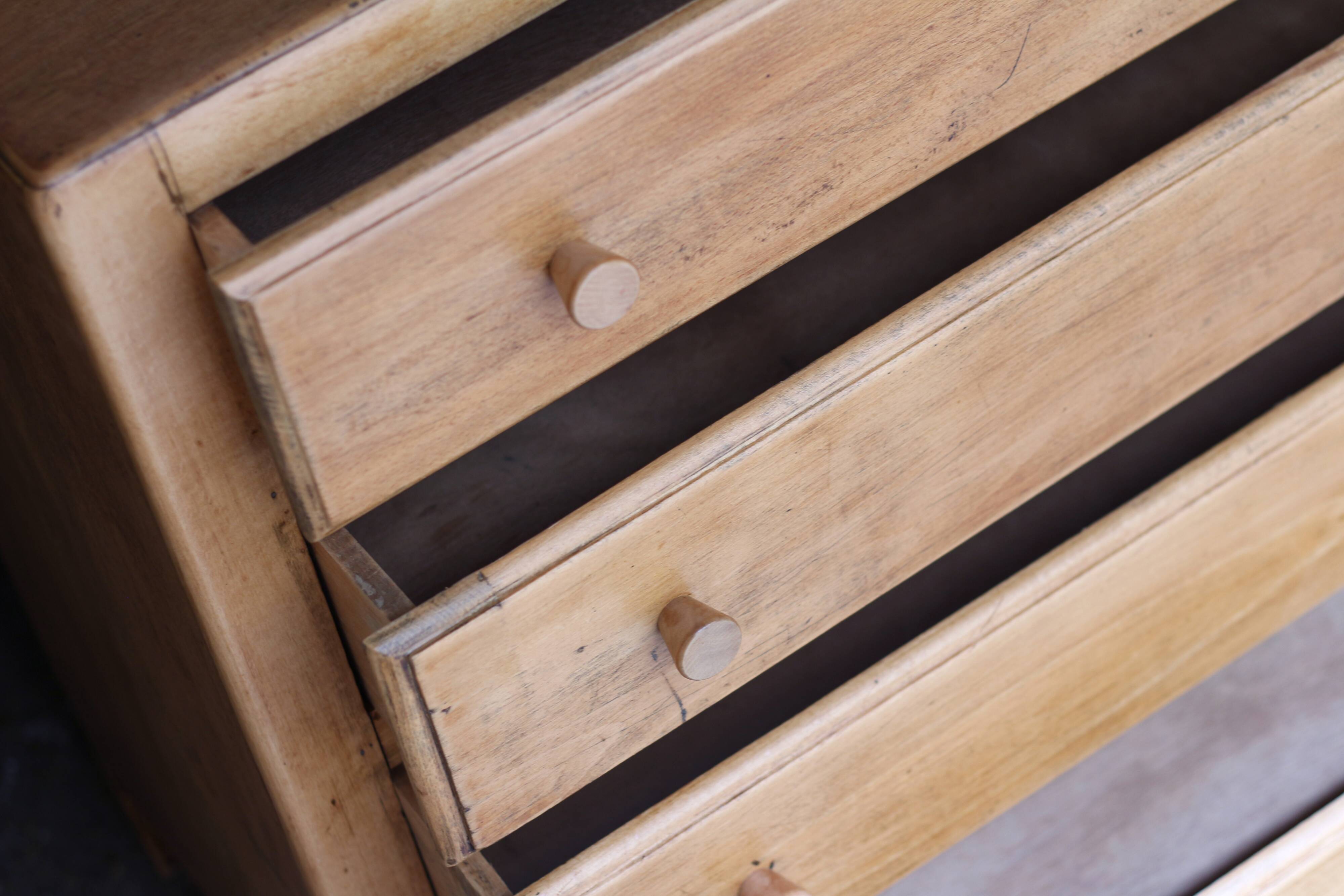 Small art deco chest of drawers in natural wood